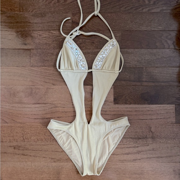 Sauvage California sexy cut out one piece swim suit cream colored beaded